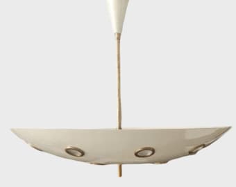 May include: A white, saucer-shaped pendant light fixture with a gold metal frame and six circular cutouts. The light fixture is suspended from a single, thin, gold metal rod.