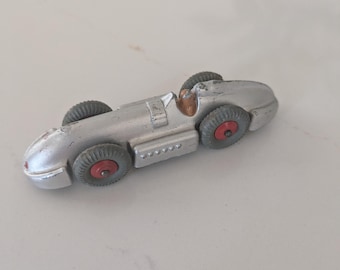 Miniatura vintage Dinky 23E "Speed of the Wind" em metal fundido prateado.