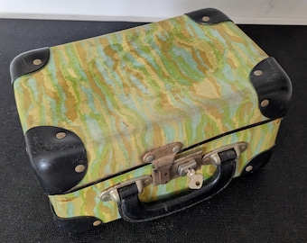 Vintage swirl pattern lockable attache type case. Made from card. Childs.