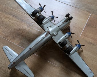 ヴィンテージのボーイング377ストラトクルーザーパンナムブリキ飛行機