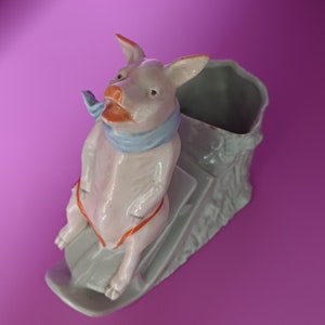 Antique "Fairing pig" in a sled, very good. Space  for Christmas candle