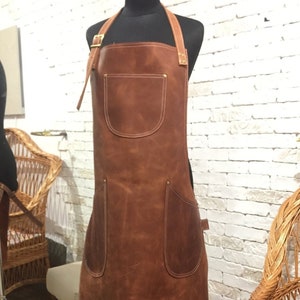 Genuine Leather Appron aprons for both in the BBQ Blacksmiths, Woodwork, Grill, Kitchen, Butcher, and Chef styles. Anniversary