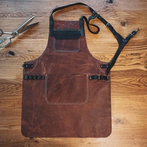 Genuine Leather Appron aprons for both in the BBQ Blacksmiths, Woodwork, Grill, Kitchen, Butcher, and Chef styles. Anniversary