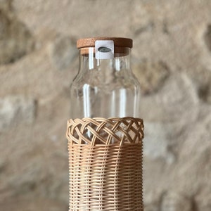 Glass and rattan water carafe