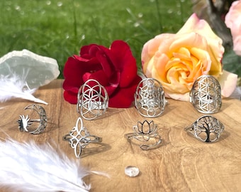 Adjustable stainless steel ring 7 models to choose from: lotus, flower of life, moon sun, Metatron, Witch's knot, tree of life, seed