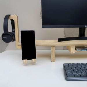 Transform your workspace with our Adjustable Dual Monitor Stand, designed for ergonomic comfort and functionality. Ideal for those who spend extended hours in front of the computer, this monitor riser alleviates back and neck pain