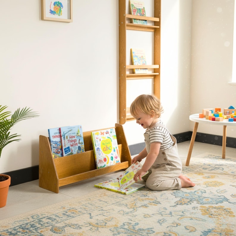 We combine Large Toddler Montessori Bookshelf and Mid Century style Modern Book Shelf Kids Room Montessori Furniture. Here is Wooden Low Nursery Bookcase, Baby Book Box! This large toddler shelf can be best gift from family to new baby boy or girl, toddler or kids. This toddler bookcase will be perfect matches with her or him toddler furniture. Unique design montessori bookcase will be perfect gift as a nursery book shelves and kids room bookcase.