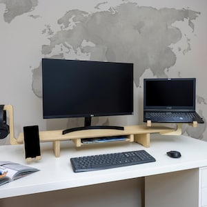 Transform your workspace with our Adjustable Dual Monitor Stand, designed for ergonomic comfort and functionality. Ideal for those who spend extended hours in front of the computer, this monitor riser alleviates back and neck pain