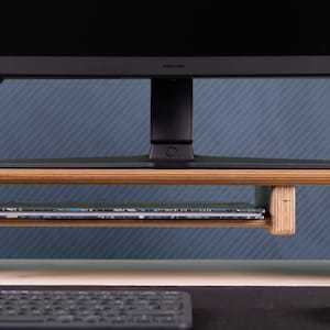 Here’s Dual Monitor Stand Riser! This Wood Computer Laptop Stand Organizer can be best Gifted from Boss to Manager. This Double Lap Monitor Desk Setup Riser Shelf will be perfect matches with her or him monitor, pc, computer or laptop.