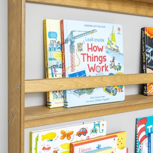We combine Montessori Bookshelf Wall Mounted with Wooden Floating Toddler Book Shelf. Here is Small Space Nursery Bookcase Toddler Furniture and Kids Room Baby Bookshelves!