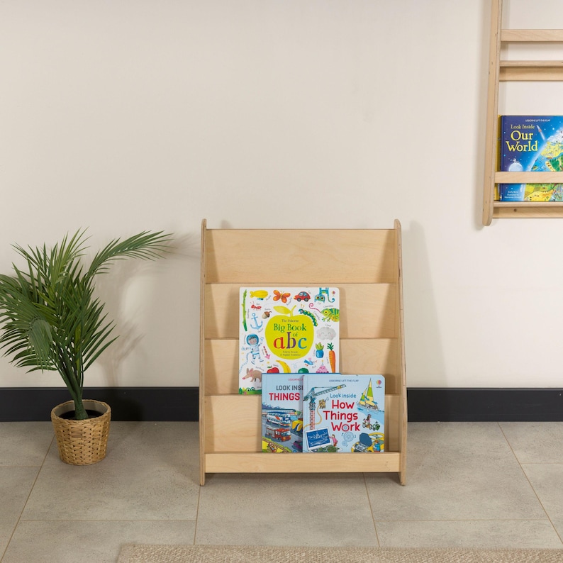 We combine Large Toddler Montessori Bookshelf and Mid Century style Modern Book Shelf Kids Room Montessori Furniture. Here is Wooden Low Nursery Bookcase, Baby Book Box! This large toddler shelf can be best gift from family to new baby boy or girl, toddler or kids. This toddler bookcase will be perfect matches with her or him toddler furniture. Unique design montessori bookcase will be perfect gift as a nursery book shelves and kids room bookcase.