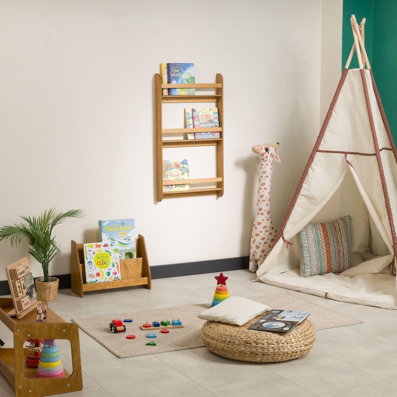 We combine Large Toddler Montessori Bookshelf and Mid Century style Modern Book Shelf Kids Room Montessori Furniture. Here is Wooden Low Nursery Bookcase, Baby Book Box! This large toddler shelf can be best gift from family to new baby boy or girl, toddler or kids. This toddler bookcase will be perfect matches with her or him toddler furniture. Unique design montessori bookcase will be perfect gift as a nursery book shelves and kids room bookcase.