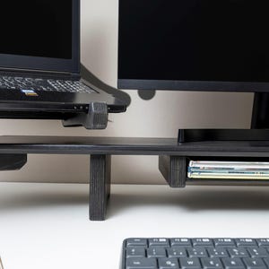 Dual Monitor Stand Riser with Drawer – Wooden Laptop Organizer & Desk Setup Shelf 🌿

Upgrade your workspace with our dual monitor stand riser, designed by the Wood and Science Team. This wooden desk organizer combines practicality, safety, and customization, making it perfect for home offices, gamers, and creative professionals.
