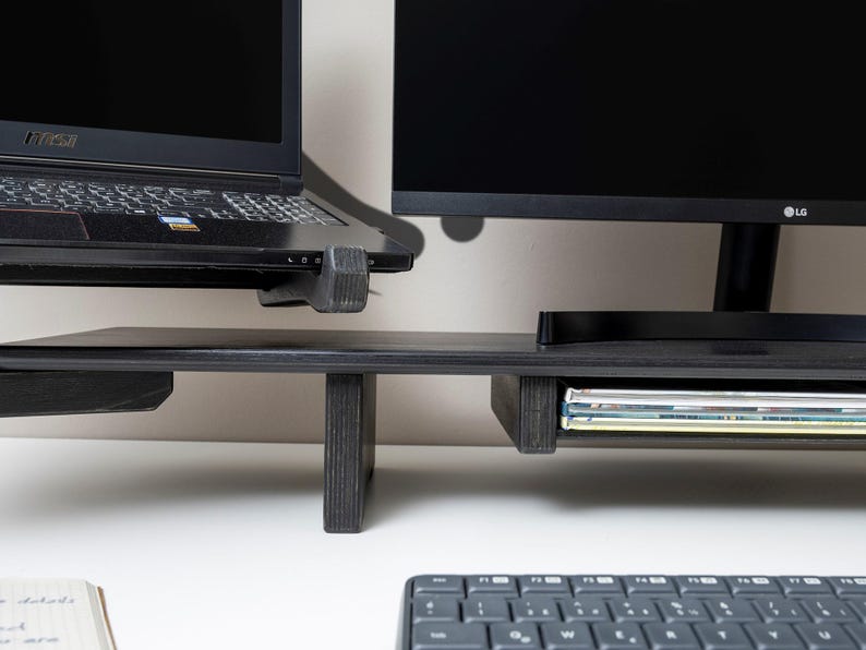 Dual Monitor Stand Riser with Drawer – Wooden Laptop Organizer & Desk Setup Shelf 🌿

Upgrade your workspace with our dual monitor stand riser, designed by the Wood and Science Team. This wooden desk organizer combines practicality, safety, and customization, making it perfect for home offices, gamers, and creative professionals.