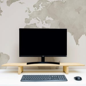 Transform your workspace with our Adjustable Dual Monitor Stand, designed for ergonomic comfort and functionality. Ideal for those who spend extended hours in front of the computer, this monitor riser alleviates back and neck pain
