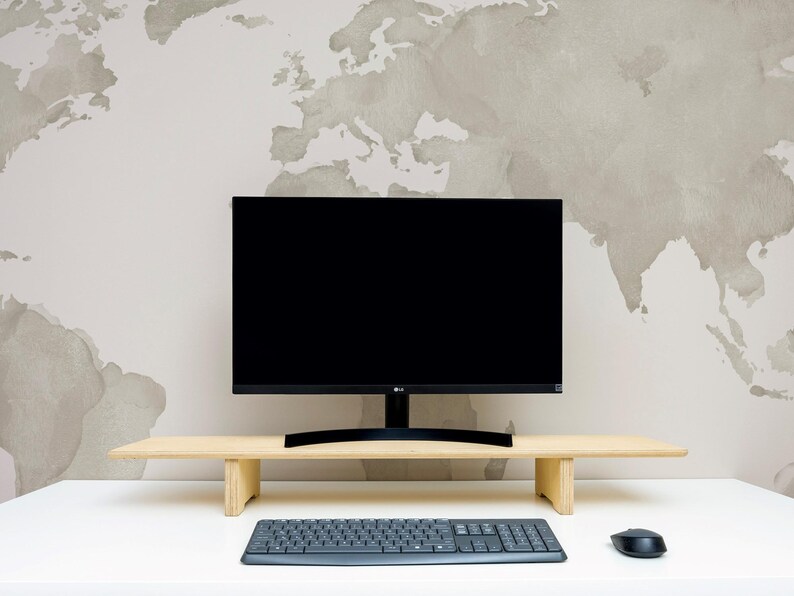 Transform your workspace with our Adjustable Dual Monitor Stand, designed for ergonomic comfort and functionality. Ideal for those who spend extended hours in front of the computer, this monitor riser alleviates back and neck pain