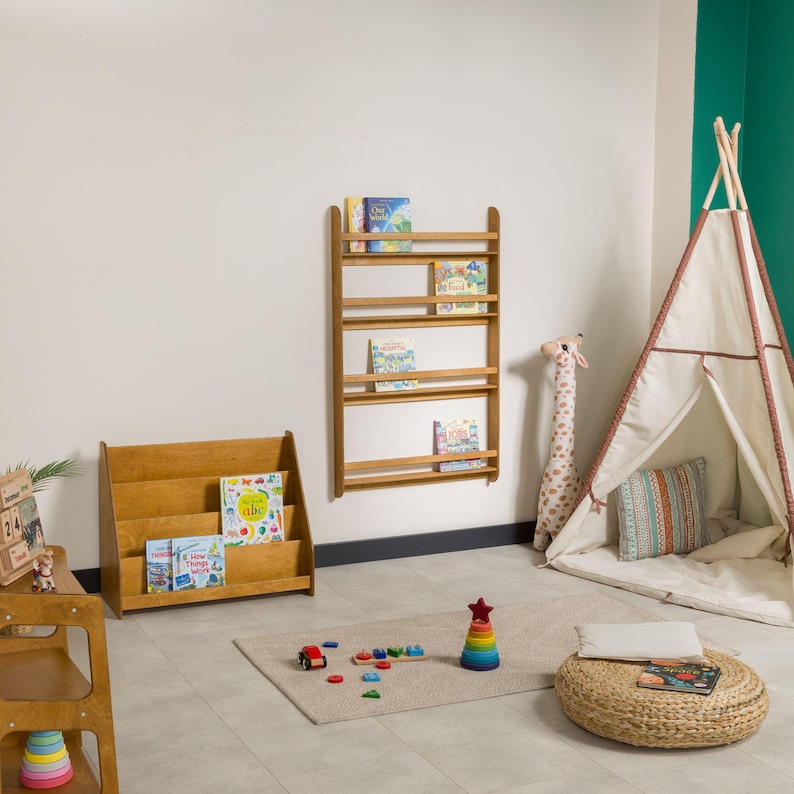We combine Large Toddler Montessori Bookshelf and Mid Century style Modern Book Shelf Kids Room Montessori Furniture. Here is Wooden Low Nursery Bookcase, Baby Book Box! This large toddler shelf can be best gift from family to new baby boy or girl, toddler or kids. This toddler bookcase will be perfect matches with her or him toddler furniture. Unique design montessori bookcase will be perfect gift as a nursery book shelves and kids room bookcase.