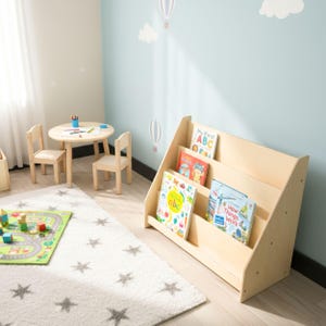 Montessori Bookshelf for Kids 📚

Low Baby Book Box – Nursery Bookcase with Front-Facing Shelves for Toddlers

Encourage your child’s love for reading with this beautifully handcrafted Montessori Bookshelf! Designed at the perfect height for toddlers, this front-facing bookcase allows little readers to easily see and choose their favorite stories — promoting independence, organization, and a love of books from an early age.
