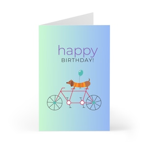 Biglietto di auguri "Buon compleanno" | Biglietto pieghevole con busta | Bassotto in bicicletta
