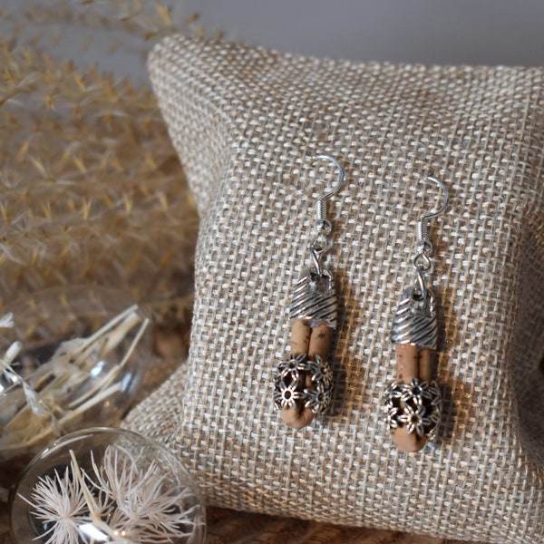 Handmade, stylish cork earrings with detailed flower bead, light and comfortable to wear.