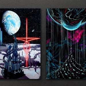May include: Two digital art prints with a space theme. The first print features a blue and white planet with a red glowing cross in the foreground. The second print features a blue and black planet with a dark, rocky surface in the foreground.