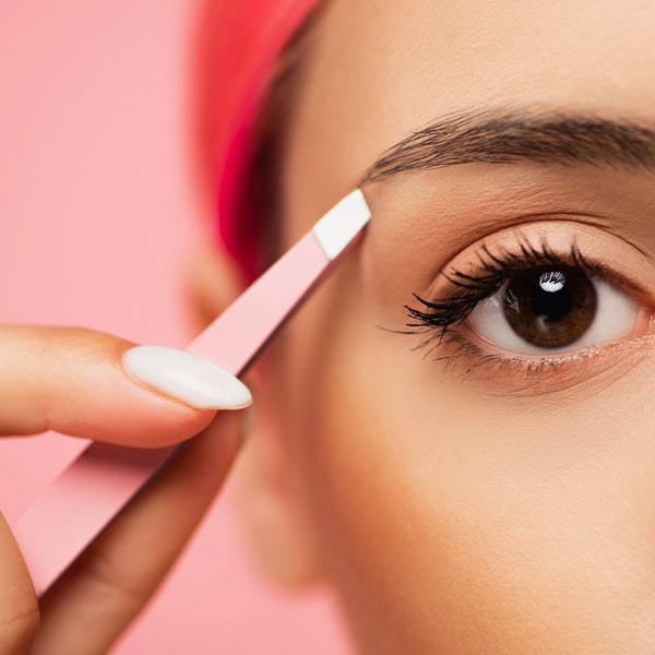 Bespoke stainless steel tweezers. We couldn't find the perfect tweezers so we made them. Pink