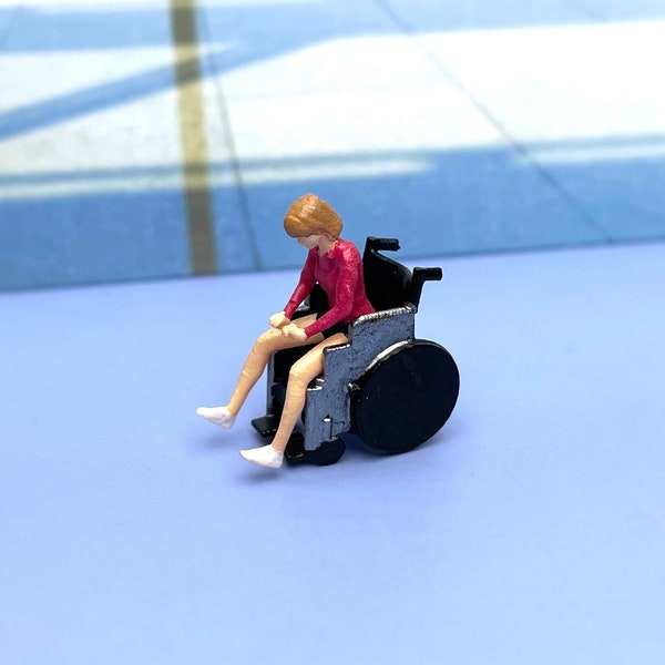 Wheelchair and Girl. Miniature Human Figures. 1:64 Scale