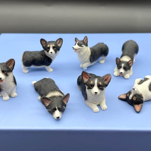 ミニチュア1/12スケールのコーギー。白黒のコーギー犬。子犬モデル