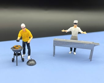 Miniatuur BBQ-grill- en chef-kokfiguren. Schaal 1:64