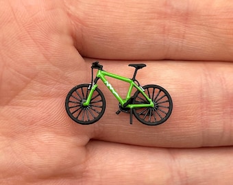 自転車とライダー。1:64スケール。マウンテンバイク/ロードバイク