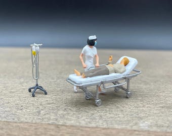 Nurse with Patient on Stretcher and IV. Miniature 1:64 Scale Model