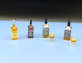 Miniature Whiskey Bottles, Drink Glasses. 1:24 Scale Dollhouse Kitchen Accessories product logo