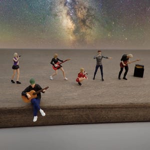Miniature di gruppi musicali. Scala 1:64. Chitarra, bassista, amplificatore, cantante.