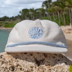 White and Blue Embroidered Corduroy Rope Adventure Snap Back Hat