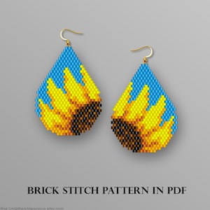 May include: A pair of beaded earrings with a sunflower design. The earrings are teardrop shaped and feature a blue background with a yellow sunflower in the center. The earrings are made with brick stitch and are available as a PDF pattern.
