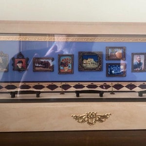 Museum wall or wing with exhibition of Vincent Van Gogh paintings