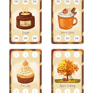 May include: Four illustrated cards with autumn themes. One card shows a candle labeled "Hygge", another a mug of "Warm Spice", a cupcake labeled "Pure Joy", and a card with an apple tree labeled "Apple Picking". Each card has a decorative leaf border.