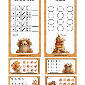May include: A set of printable game sheets with an autumn theme, featuring "Mini Shut The Box" and "Roll A D3" scorecards. The designs include illustrations of bears, raccoons, pumpkins, and fall leaves, with the text "The Enchanted Owls Nest" at the bottom.