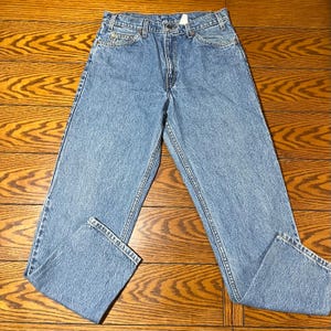 Jeans Levi's 550 vintage con etiqueta naranja, color azul, corte relajado, para hombre, talla 33 x 30. Etiqueta con error poco común.