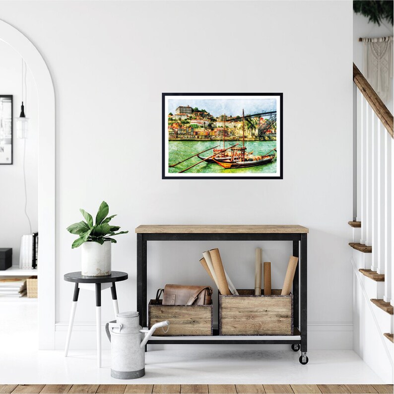 Capture the charm of Porto's Ribeira district with this printable watercolor art. Showcasing the iconic colorful facades along the Douro River and the historic atmosphere of this UNESCO World Heritage Site, this digital wall art adds a touch of Portuguese elegance to your home or office. As an instant download, it’s easy to print and display, celebrating the beauty and culture of Porto in a unique and artistic way
