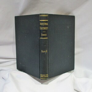 May include: A dark green hardcover book with gold lettering on the spine. The title is "Industrial Electricity" by Dawes, Part II. The book is published by McGraw-Hill Book Company.