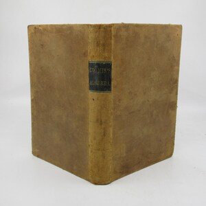 May include: A brown leather-bound book with the title "LOOMIS'S ALGEBRA" printed on the spine.