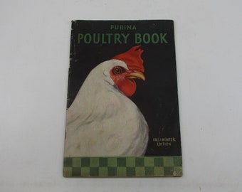 May include: A vintage Purina Poultry Book with a white chicken on the cover. The book is titled "Purina Poultry Book" and has the text "Fall-Winter Edition" at the bottom.