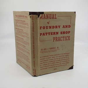 May include: A vintage book cover with a brown and tan background. The title is "Manual of Foundry and Pattern Shop Practice" by Otis J. Benedict, Jr. The book is published by McGraw-Hill Book Company, Inc.