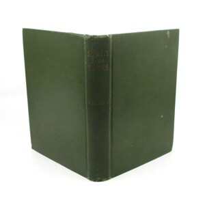 May include: A dark green hardcover book with the title "Shadows of the Rocks" printed in gold lettering on the spine.