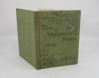 May include: A green book titled "Our Wonderful Bodies: First Book" from Hutchinson's Physiological Series. The book cover features a leafy design and the publisher's information.