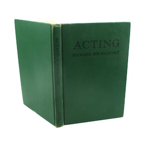 May include: A hardcover book titled "ACTING" by Richard Boleslavsky. The book has a dark green cover with the title and author's name in black. The spine also features the title and author's name in a vertical orientation.