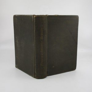 May include: A dark green hardcover book with the title "Prisoner of Zenda" printed on the spine.
