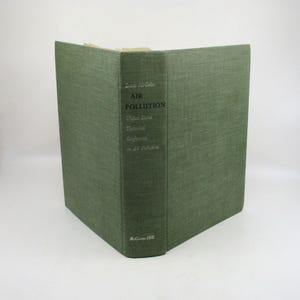 May include: A green hardcover book titled "Air Pollution" by Louis C. McCabe. The book is a publication of the United States Technical Conference on Air Pollution and was published by McGraw-Hill.