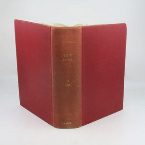 May include: A red hardcover book titled "Poultry Science" with the year "1955" printed on the spine. The book is by J.G.  Helfrich.